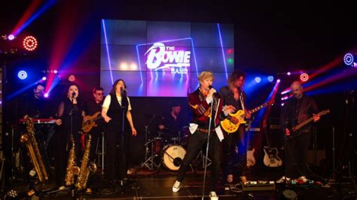 David Bowie tribute band remove unvaccinated drummer Woody Woodmansey