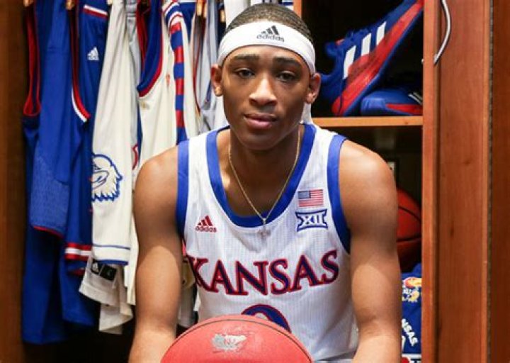 KU basketball PG Dajuan Harris visits with Russell Robinson Kansas