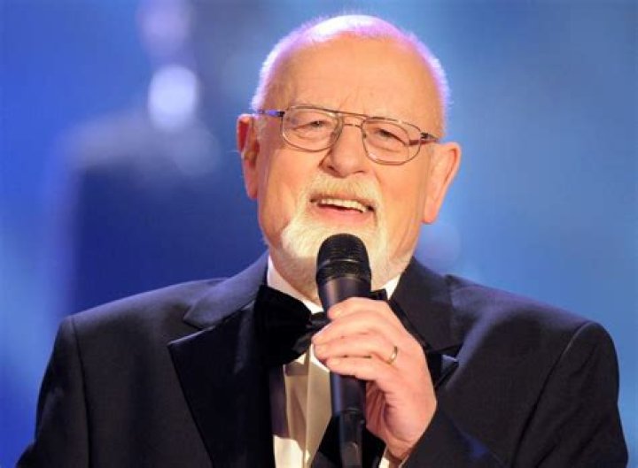 Singer Roger Whittaker and his daughter Jessica recording a Christmas